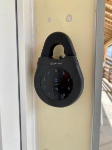 a lock on the door of a room at Appartement idéal pour été et hiver, situé au pied des pistes de ski et des sentiers de randonnée in Prémanon
