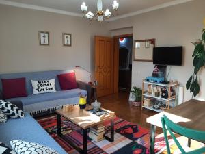 Et opholdsområde på Cosy central apartment