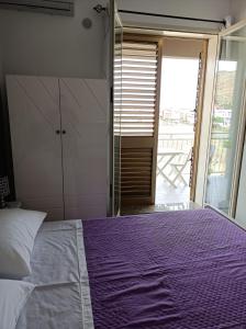 A bed or beds in a room at Vacanze in Sicilia