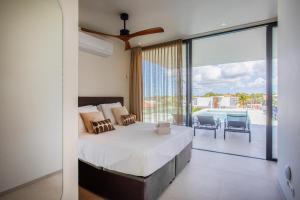 Rúm í herbergi á Villa Wahoo