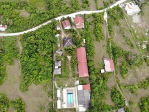 an overhead view of a park with a road at Casa James Apartment, Rooms , Pool and Restaurant in Siquijor