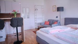 Posteľ alebo postele v izbe v ubytovaní Comfortable Apartments Vienna 1100 with contactless Check-in