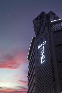 a building with the intel logo on it at sunset at Iro Hotel Wolgot by ANNK in Siheung