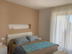 Postel nebo postele na pokoji v ubytování Villa Pasquy + 37 fotografií