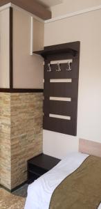 Ένα ή περισσότερα κρεβάτια σε δωμάτιο στο ASA Hotel