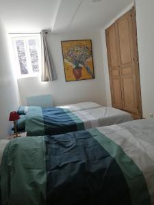 Posteľ alebo postele v izbe v ubytovaní logement entier spacieux et confortable à 1 h de Paris