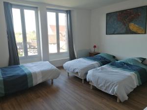 Posteľ alebo postele v izbe v ubytovaní logement entier spacieux et confortable à 1 h de Paris