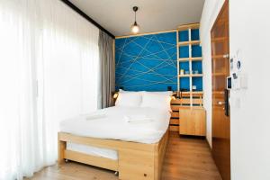 Postel nebo postele na pokoji v ubytování Miller Hotel