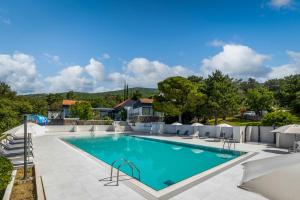 an image of a swimming pool at a house at Holiday Resort Ad Turres in Crikvenica