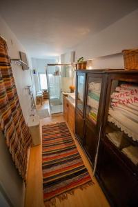 a bedroom with a bunk bed and a bathroom at Architect Art Studio in Athens