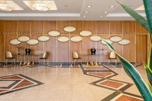 De lobby of receptie bij Divani Apollon Palace & Thalasso