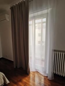 Postel nebo postele na pokoji v ubytování Aura Home rent of rooms with shared kitchen