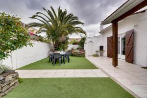 Ogród w obiekcie La Casa Bohème - Superbe maison avec parking privé
