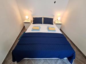 Ένα ή περισσότερα κρεβάτια σε δωμάτιο στο Apartment Libra