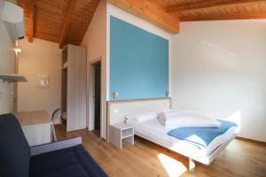 Postel nebo postele na pokoji v ubytování Agriturismo Antico Fenilon