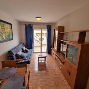 A kitchen or kitchenette at Ático dúplex con piscina privada en Vera Playa