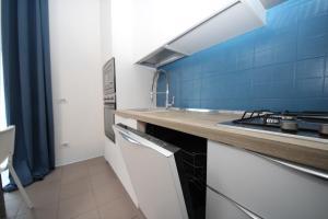 Cuisine ou kitchenette dans l'établissement Residence Verdena appartamento 02