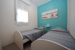 Fotografie z fotogalerie ubytování Residence Verdena appartamento 02 v destinaci Rosolina Mare + 19 fotografií