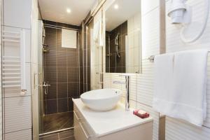 Koupelna v ubytování Miller Hotel
