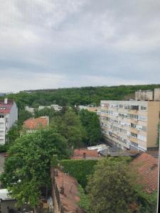 Budova, kde se apartmán nachází + 5 fotografií