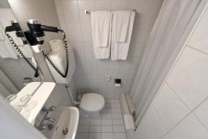Koupelna v ubytování Hotel National Bern