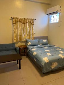 Letto o letti in una camera di Sin Yu Guest House