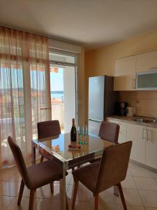 Kuchyň nebo kuchyňský kout v ubytování Apartments Zulim
