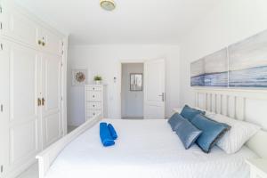 Postel nebo postele na pokoji v ubytování Villa Amigo