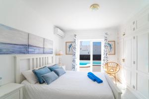 Postel nebo postele na pokoji v ubytování Villa Amigo + 23 fotografií