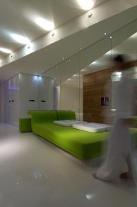 Letto o letti in una camera di i-Suite Hotel