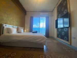 Кровать или кровати в номере Fun B&B