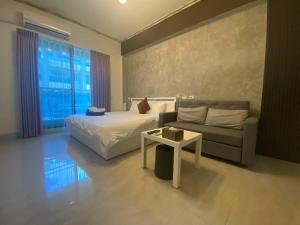 Кровать или кровати в номере Fun B&B