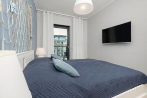 Posteľ alebo postele v izbe v ubytovaní Apartamenty Morska Fala-Gardenia