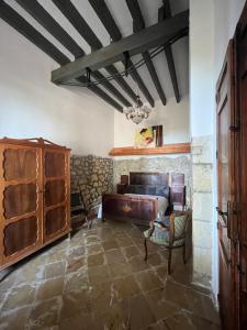 a living room with a couch and a table at EL POBLET DE ATALAYAS in Alicante