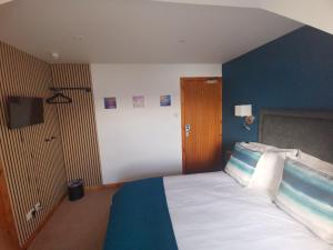 Katil atau katil-katil dalam bilik di Lochbroom Lodge