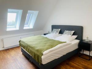 Кровать или кровати в номере Ferienpraxis Heudeber