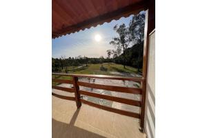 a view from a balcony with a view of a river at OYO Pousada Coisa Mais Linda in Iguape