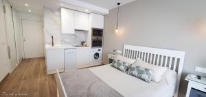 Kuchyň nebo kuchyňský kout v ubytování Elegante estudio frente a la playa