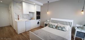 Kuchyň nebo kuchyňský kout v ubytování Elegante estudio frente a la playa