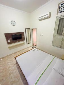 Letto o letti in una camera di Hotel Besar Purwokerto