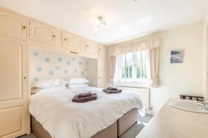 Легло или легла в стая в Elvington Cottage - Family-friendly cheerful house at the heart of the Cotswolds
