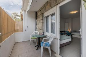 En balkon eller terrasse på Lerose Apartman