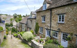 a group of stone houses in a village at The Surveyor's House Tetbury in Tetbury