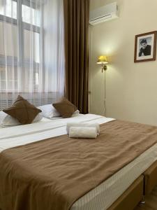 Un pat sau paturi într-o cameră la Belon Land