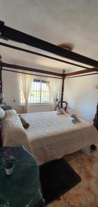 Posteľ alebo postele v izbe v ubytovaní Villa Don Giovanni Fuengirola, Piscina Privada y vistas al mar y a la Montaña
