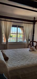 Posteľ alebo postele v izbe v ubytovaní Villa Don Giovanni Fuengirola, Piscina Privada y vistas al mar y a la Montaña + 37 fotografií