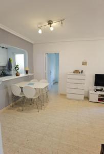 TV a/nebo společenská místnost v ubytování Apartament z dużym tarasem na pięknym osiedlu