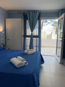Posteľ alebo postele v izbe v ubytovaní HOTEL MERCURIO SUL MARE - Fish restaurant and private beach