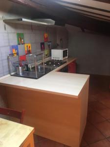 Kuchyň nebo kuchyňský kout v ubytování Affittacamere ACCASA