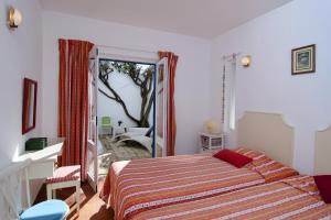 Una cama o camas en una habitación de 602 Casa Alma Mar